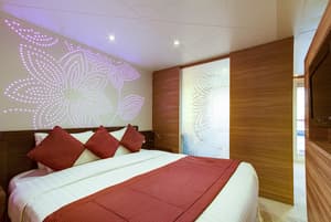 Cruise & Maritime Voyages Magellan Accommodation Royal Suite Bedroom.jpg