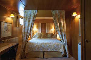 Belmond River Cruises Belmond Fleur de Lys Accommodation Bedroom 1.jpg