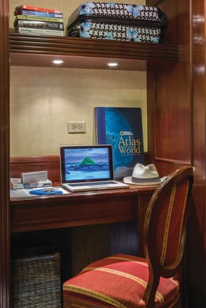Lindblad Expeditions National Geographic Islander Accommodation Category 3 Desk.jpg