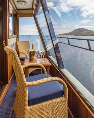 Lindblad Expeditions National Geographic Islander Accommodation Category 5 Balcony.jpg