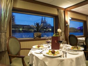 The River Cruise Line MS Serenity Interior Restaurant 1.jpg