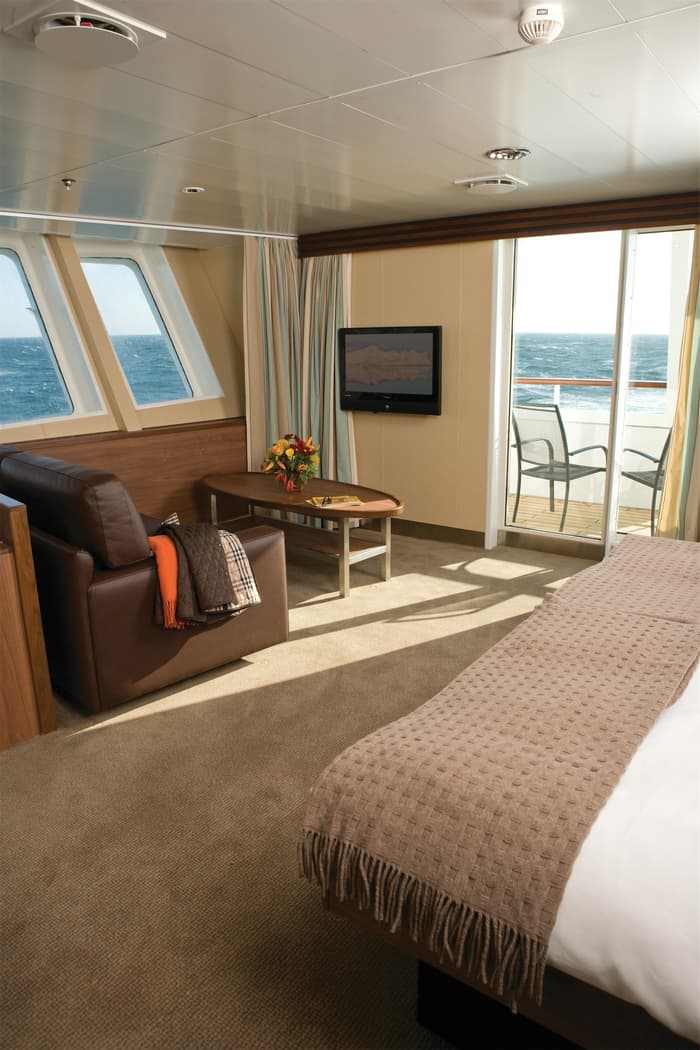 Lindblad Expeditions National Geographic Explorer Accommodation Category 7 Suite with Balcony.jpg