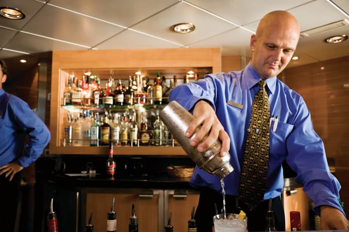 Lindblad Expeditions National Geographic Explorer Interior Bar Bartender.jpg