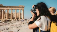 Tourist taking picture canva 1
