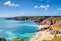 Stop in Guernsey and admire the stunning island. Credit: Shutterstock