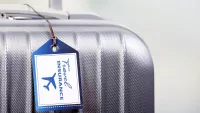 Travel insurance suitcase min