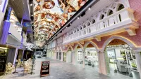 The heart of MSC Virtuosa is the Galleria Virtuosa, a 112m-long, two-deck- high indoor promenade. Credit: MSC Cruises