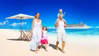 Family on beach min
