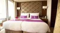 Accommodation elates onboard the 1,400-passenger Ambience. Credit: Ambassador Cruise Line