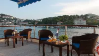 Taking in the views on board MS Mendula. Credit: Riviera Travel
