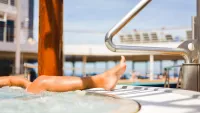 Guest relaxing spa hot tub min