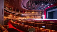 Shows take place in the Palladium Theatre. Credit: Ambassador Cruise Line