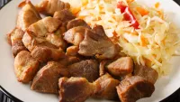 Chef Creole for popular dishes such as griot (fried pork). Credit: Shutterstock