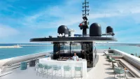 The top deck Sky Bar offers the ideal spot to watch the sun set. Credit: Emerald Cruises