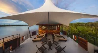 Guests can watch wildlife from the stunning outdoor lounge. Credit: Shutterstock