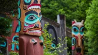 Immerse yourself in Native Alaskan culture at Ketchikan's Totem Bight State Park. Credit: Shutterstock