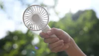 A portable fan can be worth its weight in gold on a hot day