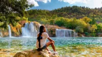 KRK waterfalls woman watching waterfall Croatia Krk national park