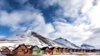 Svalbard Row of colourful chalet houses in Longyearbyen Credit Shutterstock