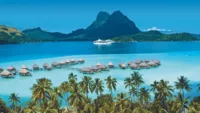 MS Paul Gauguin sailing the South Pacific | Credit: Paul Gauguin Cruises