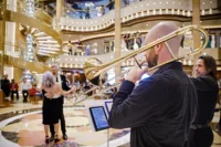The Piazza - now a classic Princess Cruises feature - was introduced with the Grand Class | Credit: Princess Cruises
