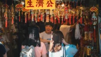 Carry some local currency to use in small shops and for taxis