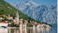Perast traditional balkan village mountain landscape by kotor bay montenegro