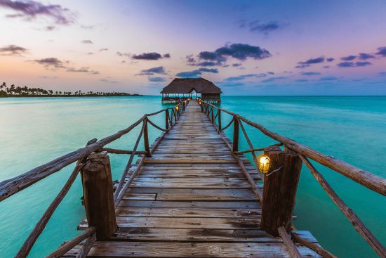 The warm waters of the Indian Ocean lap Zanzibar’s shores