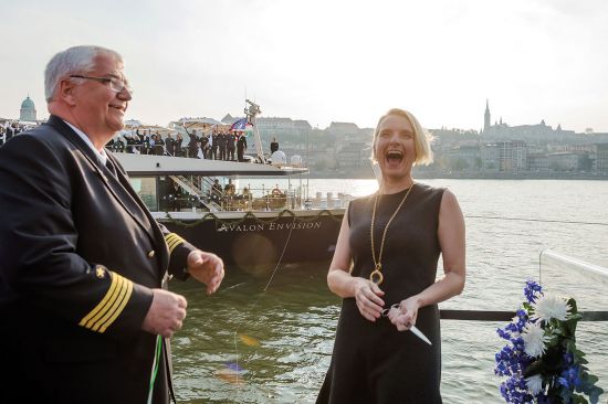 Elizabeth Gilbert christens the new ship Avalon Envision with the captain