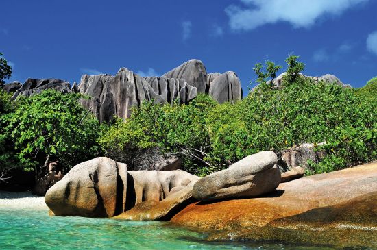 Cousine island with beach and rock formations is breeding ground for sea turtles