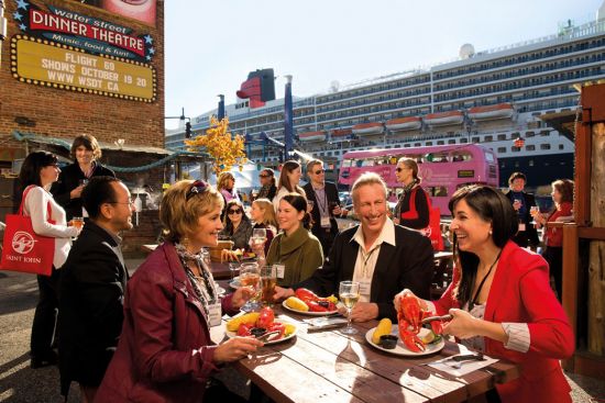 Friends enjoying seafood in Saint John, New Brunswick