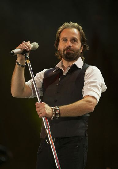 Alfie Boe performing on stage