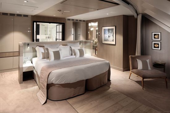 Suite on board Celebrity Edge, designed by Kelly Hoppen in neutral, muted tones