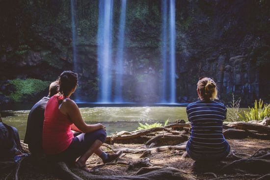 Young people looking at Kerikeri's Rainbow Falls