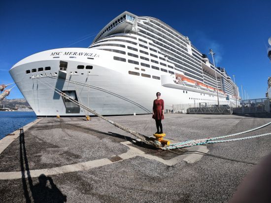 Emma Le Teace in front of MSC Cruises ship