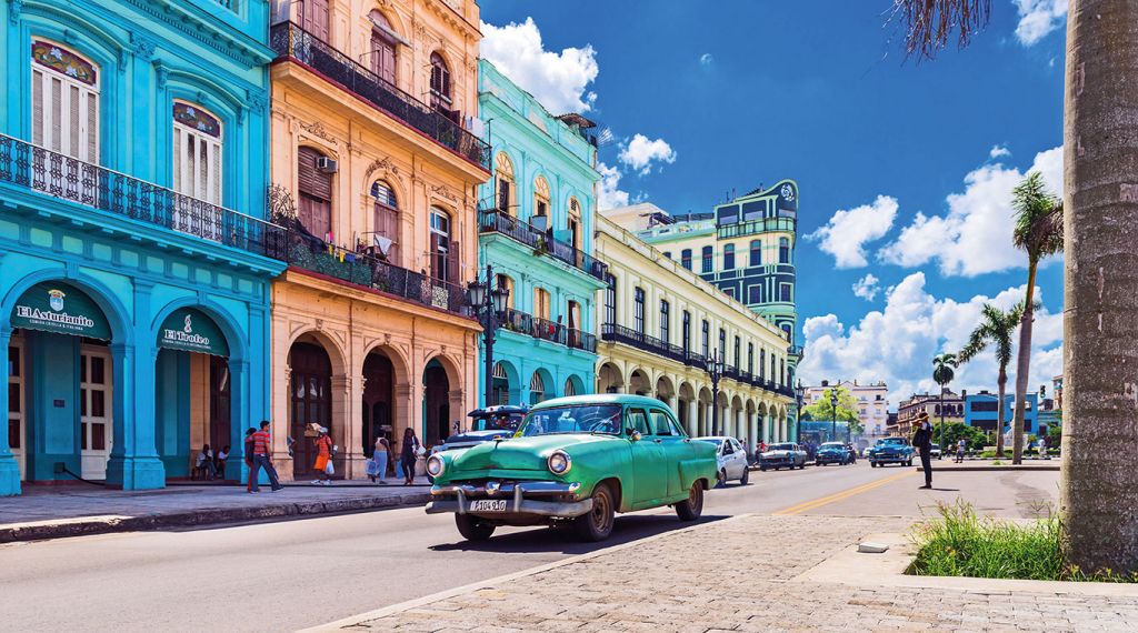 Colourful houses and classic car in Cuba